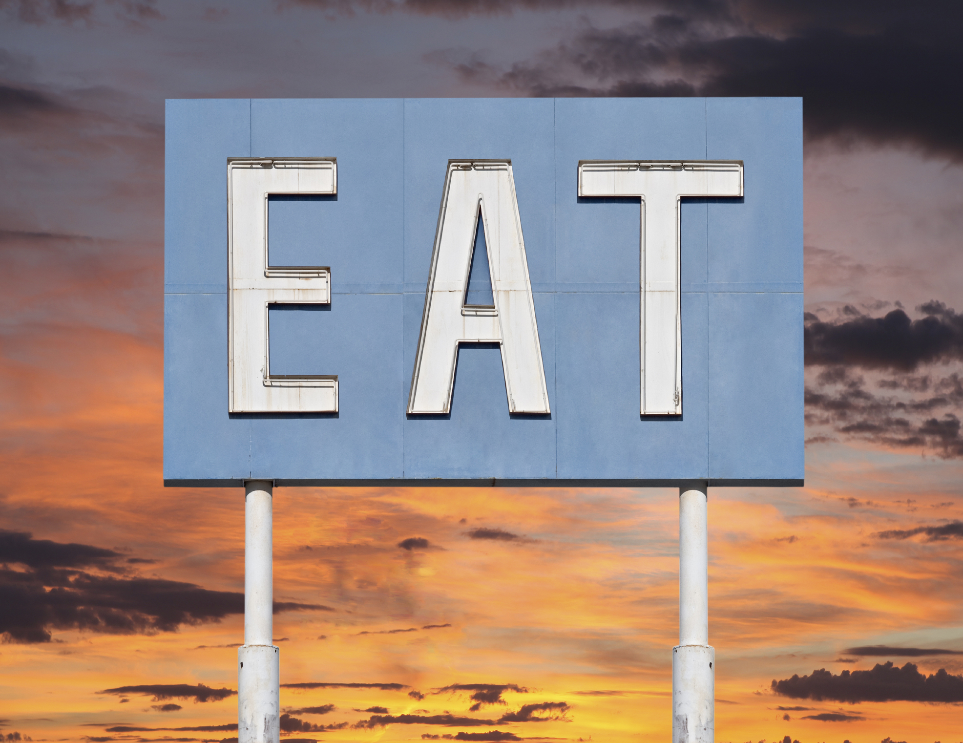 Vintage Blue Eat Sign with Sunset